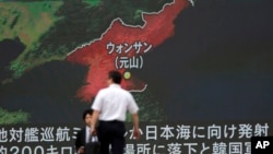 A screen shows a news program reporting about North Korea's missile firing from Wonsan, June 8, 2017, in Tokyo. North Korea fired several suspected short-range anti-ship missiles off its east coast Thursday, South Korea's military said.