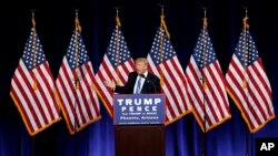 FILE - Then Republican presidential candidate Donald Trump speaks during a campaign rally at the Phoenix Convention Center, Aug. 31, 2016, in Phoenix, Arizona. Deporting undocumented immigrants and stemming the influx of new arrivals was one of the centerpieces of Trump's campaign. 