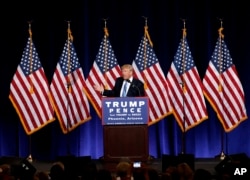 FILE - Then-Republican presidential candidate Donald Trump speaks during a campaign rally at the Phoenix Convention Center in Phoenix, Arizona, Aug. 31, 2016.