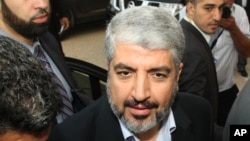 Hamas leader Khaled Meshaal arrives at the Islamist Ennahda party congress in Tunis, July, 12, 2012.
