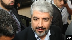 Hamas leader Khaled Meshaal arrives at the Islamist Ennahda party congress in Tunis, July, 12, 2012.