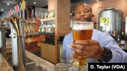Airport Craft Brewers barman Oscar Sentane prepares to serve one of Marali's blonde lagers at the O.R. Tambo airport in Johannesburg, South Africa.