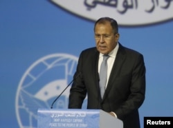 Russian Foreign Minister Sergey Lavrov delivers a speech during a session of the Syrian Congress of National Dialogue in the Black Sea resort of Sochi, Russia, Jan. 30, 2018.