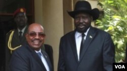 ປະທານາທິບໍດີຊູດານ ທ່ານ Omar al-Bashir (ຊ້າຍ) ແລະ
ທ່ານ Salva Kiir ປະທານາທິບໍດີ ຊູດານໃຕ້. 