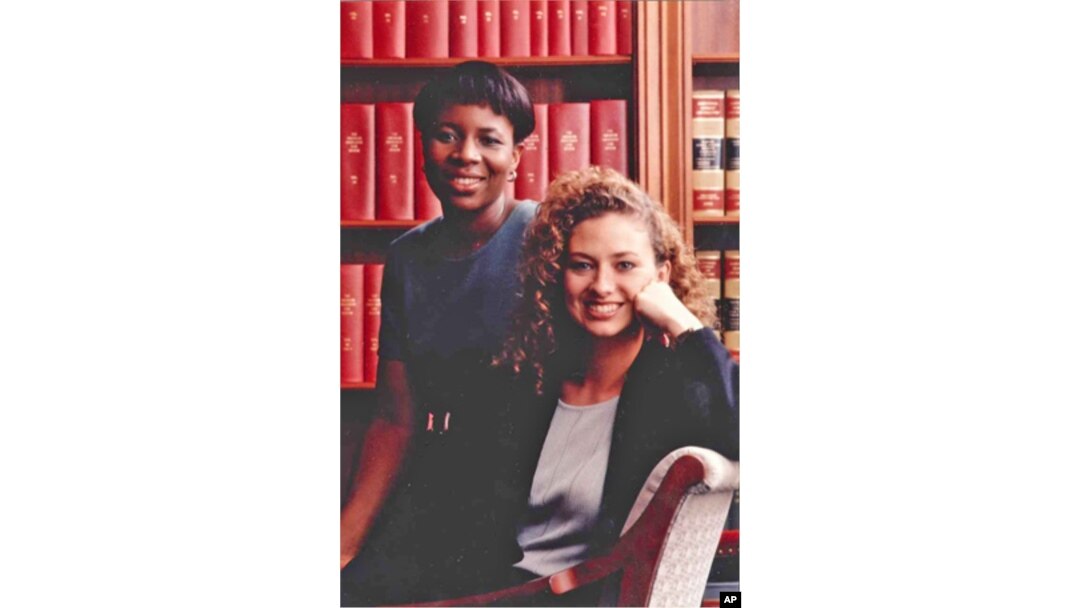 Layli Miller-Muro(seated) successfully litigated on behalf of Fauziya Kassindja, who would have faced female genital mutilation before she was granted asylum in the US.