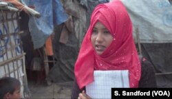 Sameela Kotima, an outpatient therapeutic volunteer, goes into the Rohingya refugees camps in Cox's Bazaar, Bangladesh, to follow up with new parents and to counsel young women about sexual health.