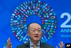 Global Finance: World Bank President Jim Yong Kim gesture while speaking at a news conference during the World Bank/IMF Annual Meetings at IMF headquarters in Washington, Thursday, Oct. 6, 2016.