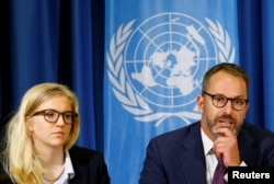 Karin Friedrich (L) and Thomas Hunecke attend a news conference on the Mission Report of the Office of the High Commissioner for Human Rights (OHCHR) rapid response mission to Cox's Bazaar, Bangladesh, for the Rohingya crisis in Myanmar, at the United Nations in Geneva, Switzerland, Oct. 11, 2017.