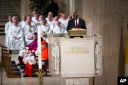 FILE - Supreme Court Justice Clarence Thomas reads a passage from the New Testament during the funeral mass for Antonin Scalia at the Basilica of the National Shrine of the Immaculate Conception in Washington, Feb. 20, 2016.