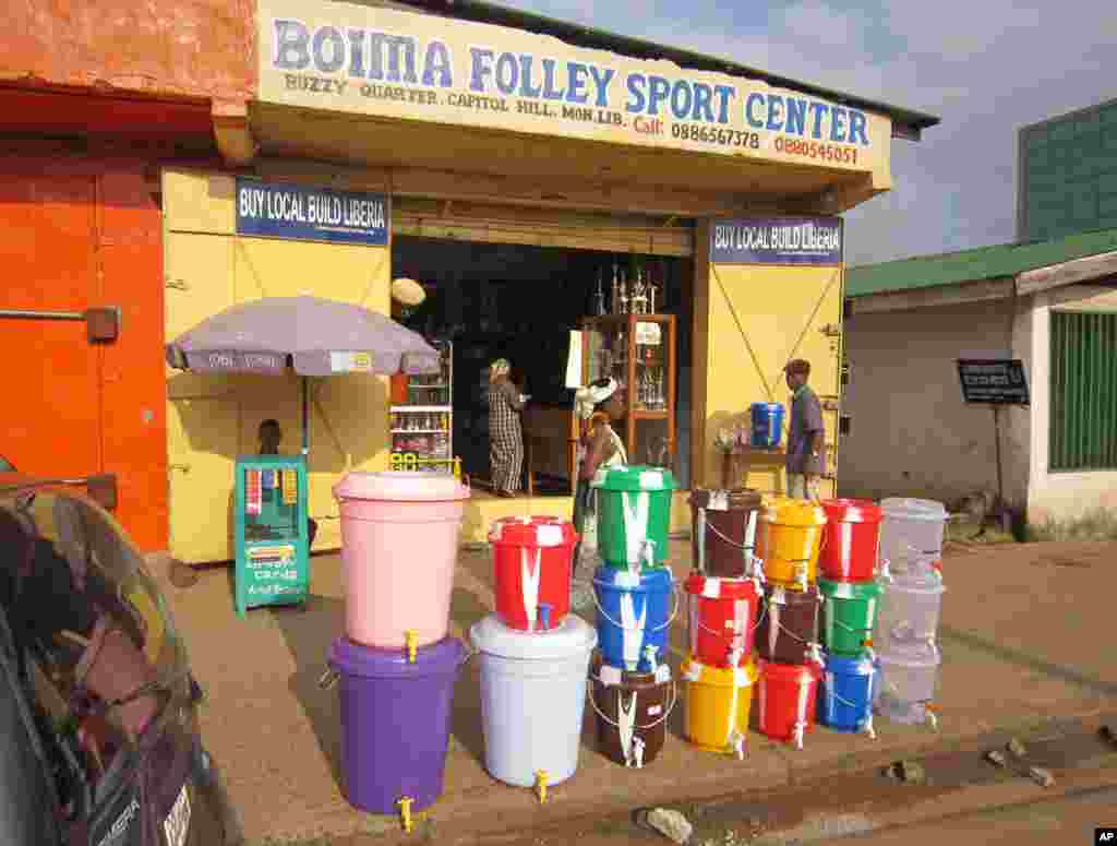 According to local reports, the sale of water buckets has increased dramatically because they are used by Liberians to wash their hands with disinfectant&nbsp;to prevent the spread of the deadly Ebola virus, Monrovia, Liberia, Aug. 4, 2014.