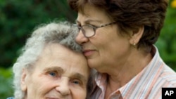 Alzheimer's patient and caregiver.