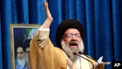 FILE - Iranian senior cleric Ahmad Khatami delivers his sermon during Friday prayers, in Tehran, Iran, Jan. 5, 2018. 