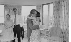 Richard Nixon hugs daughter Julie Nixon Eisenhower shortly after resigning from office on August 9, 1974. Also pictured are Nixon’s daughter Tricia Cox and her husband, Ed Cox. (National Archives)