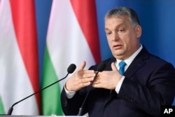 Hungarian Prime Minister Viktor Orban addresses the media during a press conference in the Cabinet Office of the Prime Minister in Budapest, Hungary, Jan. 10, 2019.