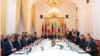 FILE - International negotiators are seen during talks on Iran's nuclear program in Vienna, Austria, Nov. 24, 2014.