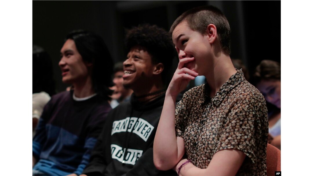 New York University students react while watching the presidential debate between Democratic candidate Hillary Clinton and Republican candidate Donald Trump during a debate watch gathering in New York, Oct. 19, 2016.