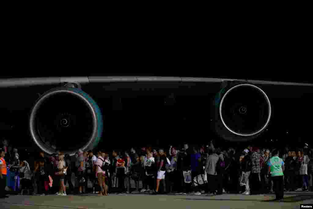 British passengers board an Airbus A380 airliner that is being used for transporting Thomas Cook customers at Dalaman Airport in Dalaman, Turkey. Thomas Cook, the world&#39;s oldest travel firm, collapsed, stranding hundreds of thousands of holidaymakers around the globe and sparking the largest peacetime repatriation effort in British history.