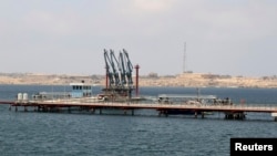 FILE - A general view of Libya's Hariga port in Tobruk, east of Benghazi.