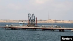 FILE - A general view of Libya's Marsa el-Hariga port in Tobruk, east of Benghazi.