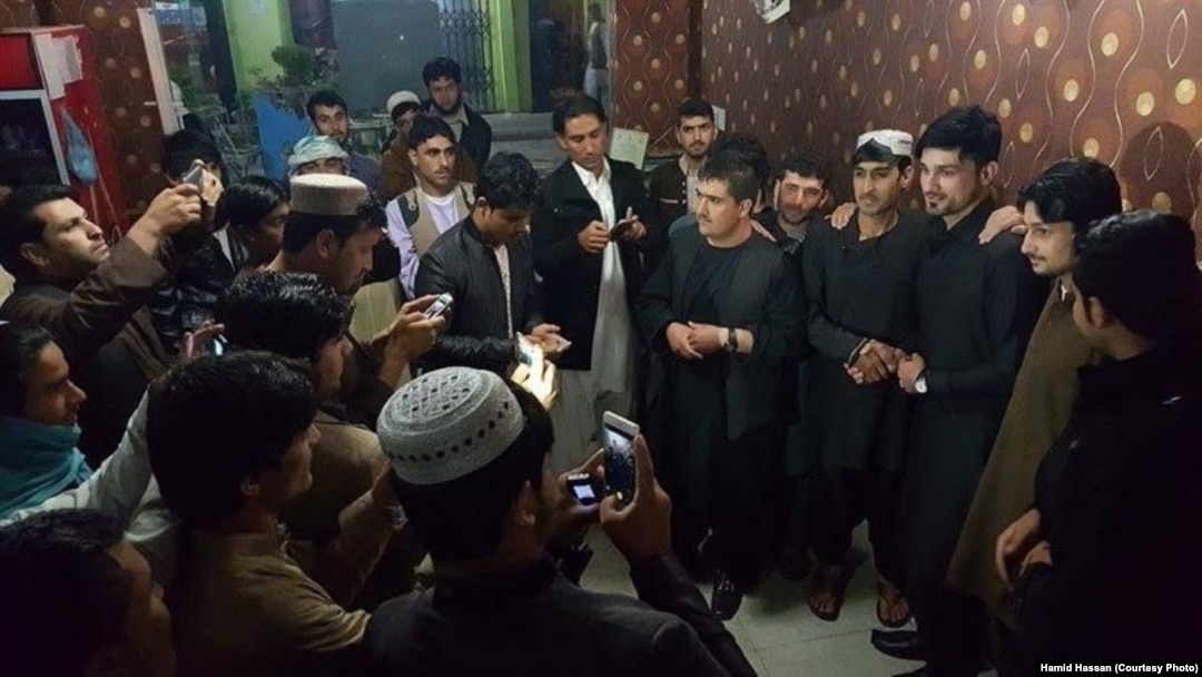 Hamid Hassan is surrounded by fans in Kandahar city, a stronghold of Taliban militants.