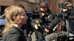 FILE - Chelsea Manning addresses the media outside federal court in Alexandria, Va., March 5, 2019. The former Army intelligence analyst was ordered to jail on March 8, 2019 for refusing to testify to a Virginia grand jury investigating Wikileaks. 