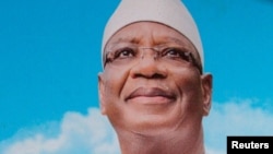 Une photo d'Ibrahim Boubacar Keita, alors président du Mali est affichée lors d'un meeting pour sa ré-élection à Bamako, Mali, le 3 août 2018.
