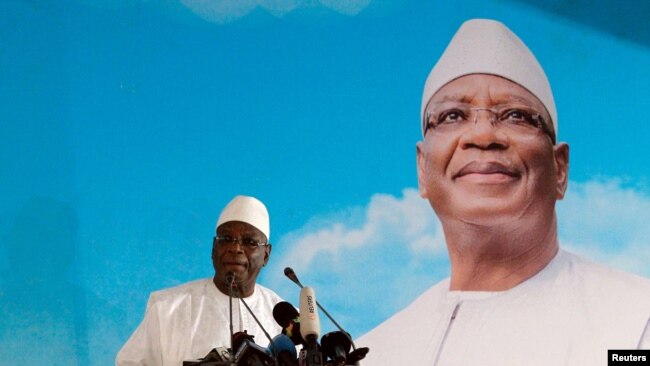 FILE - Ibrahim Boubacar Keita, President of Mali and candidate for Rally for Mali party (RPM), speaks during a meeting in Bamako, August 3, 2018.