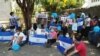 Familiares de presos políticos realizan plantón en catedral de Managua 