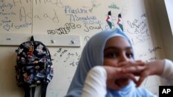 A Palestinian refugee student sits inside her classroom as she attends the first day of a new school year, at one of the UNRWA schools, in Beirut, Lebanon, Sept. 3, 2018. The United Nations' Palestinian relief agency celebrated the start of the school year in Lebanon on Monday, managing to open its schools on schedule despite a multi-million dollar budget cut on the heels of U.S. President Donald Trump's decision to stop funding to the agency.