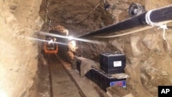 Mexico's Federal Police shows an underground tunnel that police say was built to smuggle drugs from Tijuana, Mexico to San Diego in the United States is one of the longest cross-border tunnels ever found, October 21, 2015.