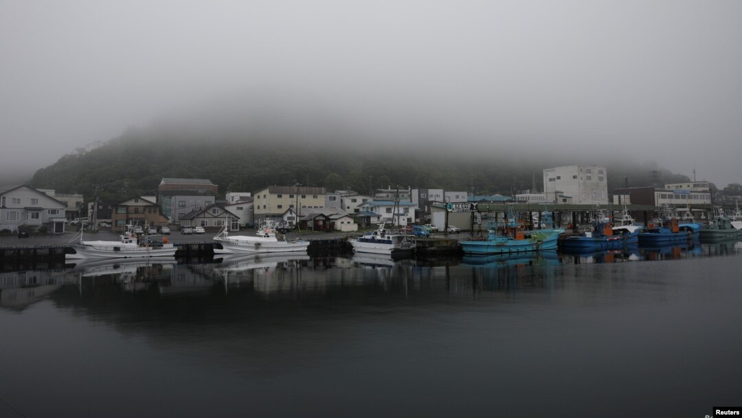 A heavy shroud of morning mist fills a port in Rausu, Hokkaido, Japan, July 2, 2019. (Reuters)