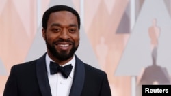 FILE - Actor Chiwetel Ejiofor, shown at the 87th Academy Awards in Hollywood, California, Feb. 22, 2015, was among the big names in the newly released video "What They Took With Them."