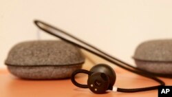 Google Pixel Buds are shown at a Google event at the SFJAZZ Center in San Francisco, Wednesday, Oct. 4, 2017. (AP Photo/Jeff Chiu)