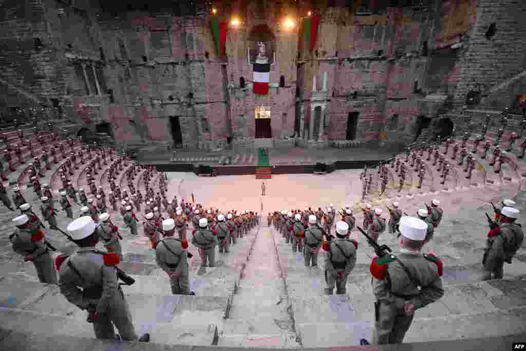 Soldiers of the 1st Foreign Cavalry Regiment of the French Foreign Legion stand guard during the rehearsal of the ceremony in the ancient theater of Orange marking the commemoration of the battle of Camaron, which occurred on 30 April 1863 between the French Foreign Legion and the Mexican army. The ceremony will mark the regiment&#39;s last public appearance in Orange before its move to its new base in Carpiagne.