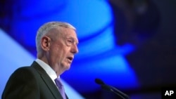 U.S. Defense Secretary Jim Mattis gives a speech about "The United States and Asia-Pacific Security" at the first plenary session at the 2017 International Institute for Strategic Studies (IISS) Shangri-la Dialogue, an annual defense and security forum in Asia, Saturday, June 3, 2017 in Singapore. (AP Photo/Joseph Nair)