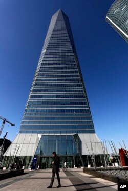 This Jan. 16, 2019 photo shows the Crystal Tower skyscraper in Madrid, Spain. The high-rise building supposedly hosted a company called FlameTech.