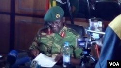 Colonel Everson Mugwisi addressing journalists in Harare on Wednesday.