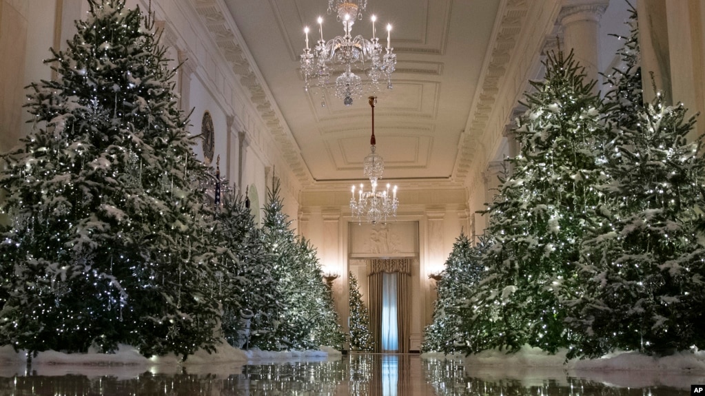 The Cross Hall are decorated with "The Nutcracker Suite" theme is seen during a media preview of the 2017 holiday decorations at the White House in Washington, Monday, Nov. 27, 2017. (AP Photo/Carolyn Kaster)