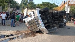 An overturned truck is seen after a trailer crash in the southern Mexican state of Chiapas killed at least 50 people, most of them migrants from Central America, in Tuxtla Gutierrez, Chiapas, Mexico December 9, 2021.
