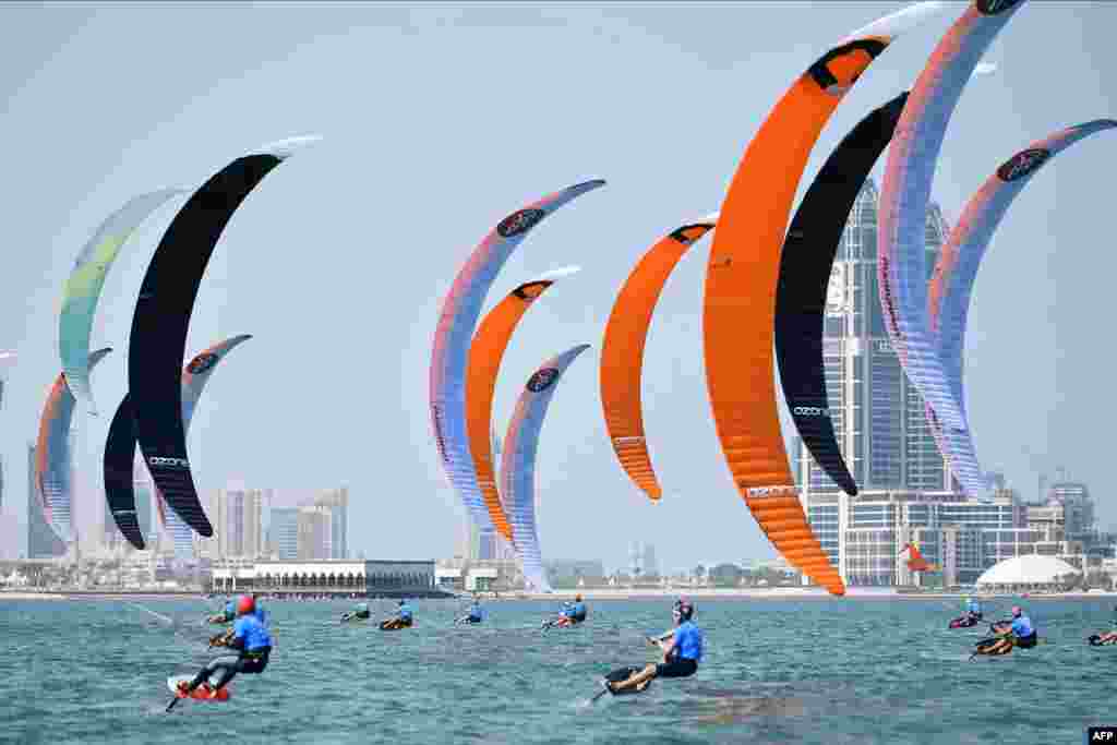 A handout picture provided by the Association of National Olympic Committees shows competitors during a kitefoil race at Doha&#39;s Katara Beach, Qatar, on the third day of the 1st ANOC World Beach Games.