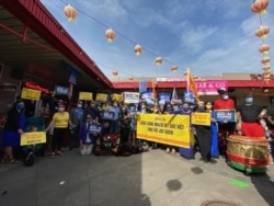 A rally of Biden supporters in front of Eden Center in northern Virginia