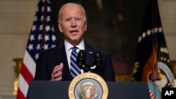  TT Mỹ Joe Biden phát biểu về biến đổi khí hậu và tạo công ăn việc làm để sản xuất năng lượng sạch, tại Tòa Bạch Ốc ngày 27/1/2021, (AP Photo/Evan Vucci)