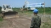 U.N. peacekeepers from South Korea break ground in 2014 in South Sudan's Jonglei state. Bor, the capital, has not suffered seasonal flooding since the 17-kilometer dike was built. 