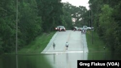 A number of streets in the Houston, Texas, area have been closed by flooding, including Flintridge Street in The Woodlands, just north of Houston, May 28, 2016. 