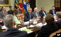 President Barack Obama meets with business leaders in the Roosevelt Room of the White House in Washington, Oct. 19, 2015.
