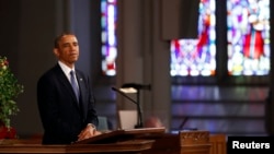 U.S. President Barack Obama speaks during an interfaith memorial service at the Cathedral of the Holy Cross, for the victims of the Boston Marathon bombing in Boston, April 18, 2013. 