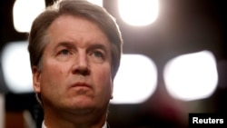 FILE - U.S. Supreme Court nominee Brett Kavanaugh listens during his Senate Judiciary Committee confirmation hearing on Capitol Hill in Washington, U.S., Sept. 4, 2018. 