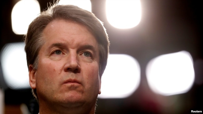 FILE - U.S. Supreme Court nominee Brett Kavanaugh listens during his Senate Judiciary Committee confirmation hearing on Capitol Hill in Washington, U.S., Sept. 4, 2018.