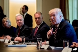 FILE - President Donald Trump speaks during a Cabinet meeting, June 12, 2017, in the Cabinet Room of the White House in Washington. On the failure of the health care law repeal effort Trump said "You can't have everything."