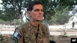 Army Gen. Joseph Votel speaks to reporters May 21, 2016 during a secret trip to Syria. 